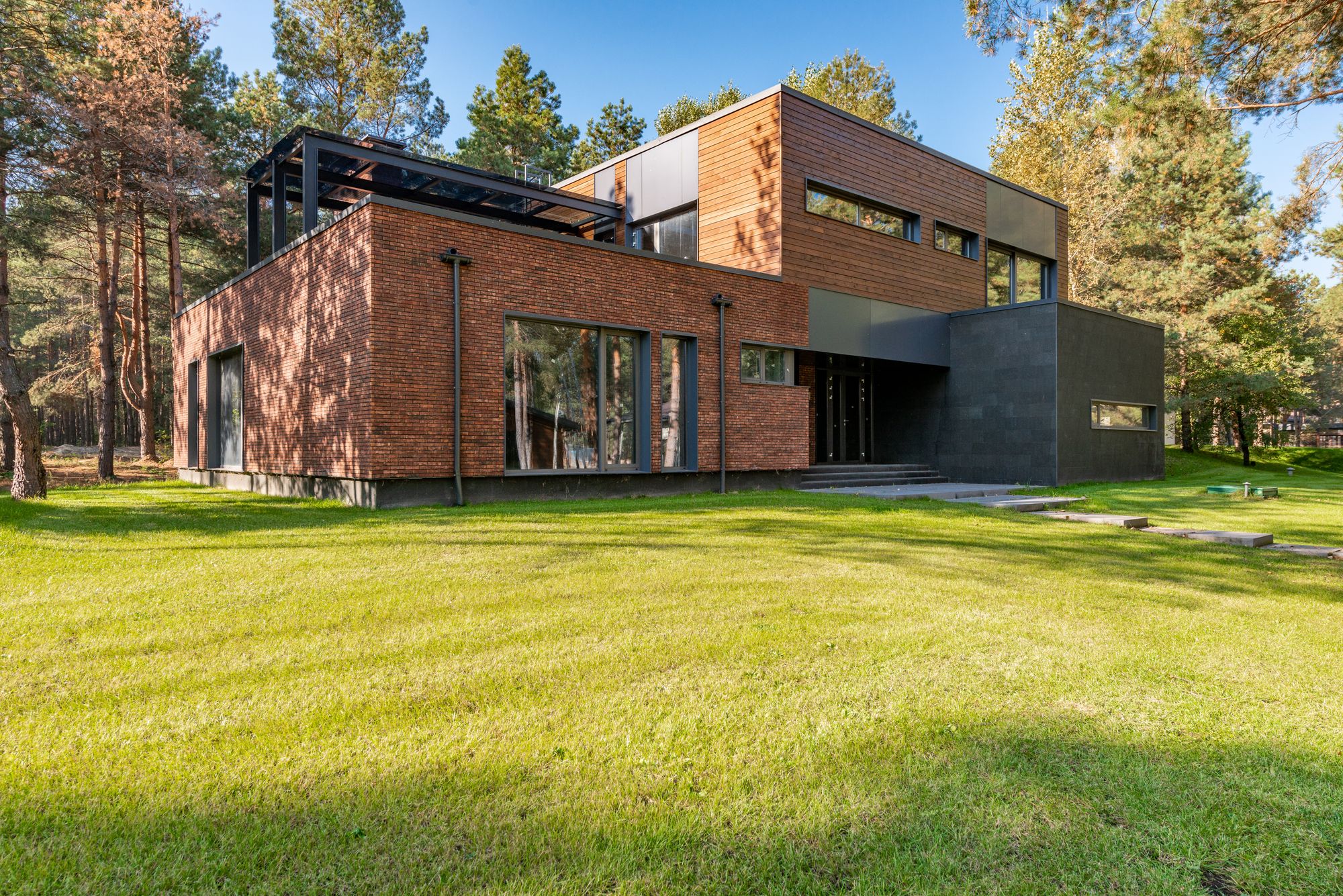 Completed contemporary brick home with carefully detailed construction